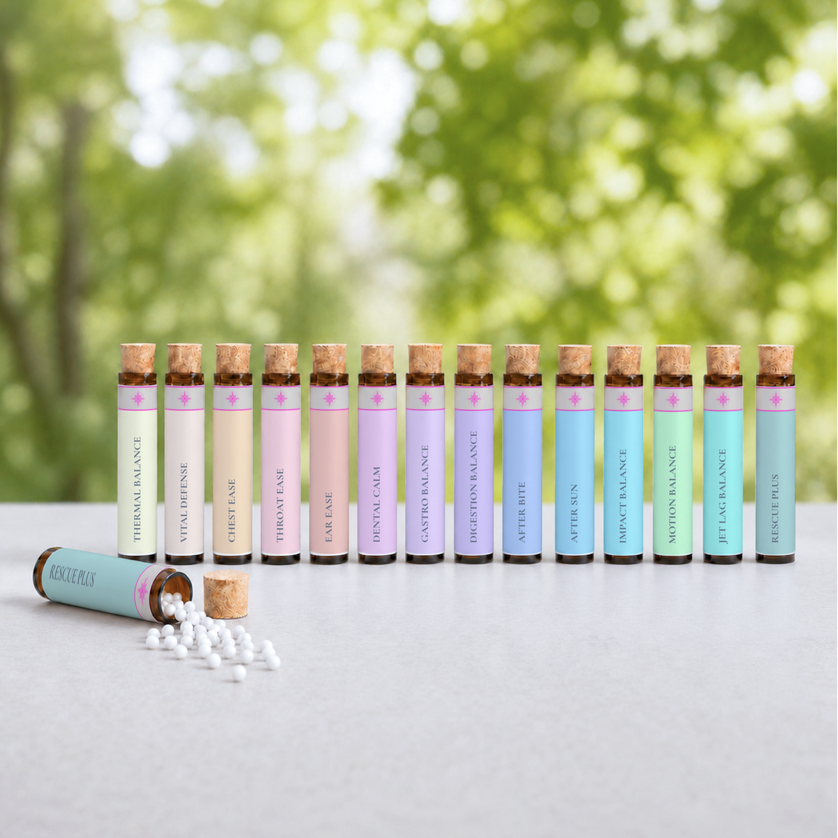 The 14 Nomad Secrets vials laid out from the S.O.S. Travel Companion pocket collection